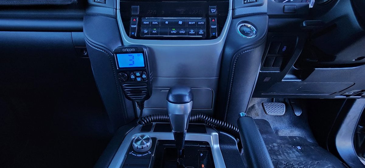 Oricom UHF handset mounted on a LandCruiser centre console