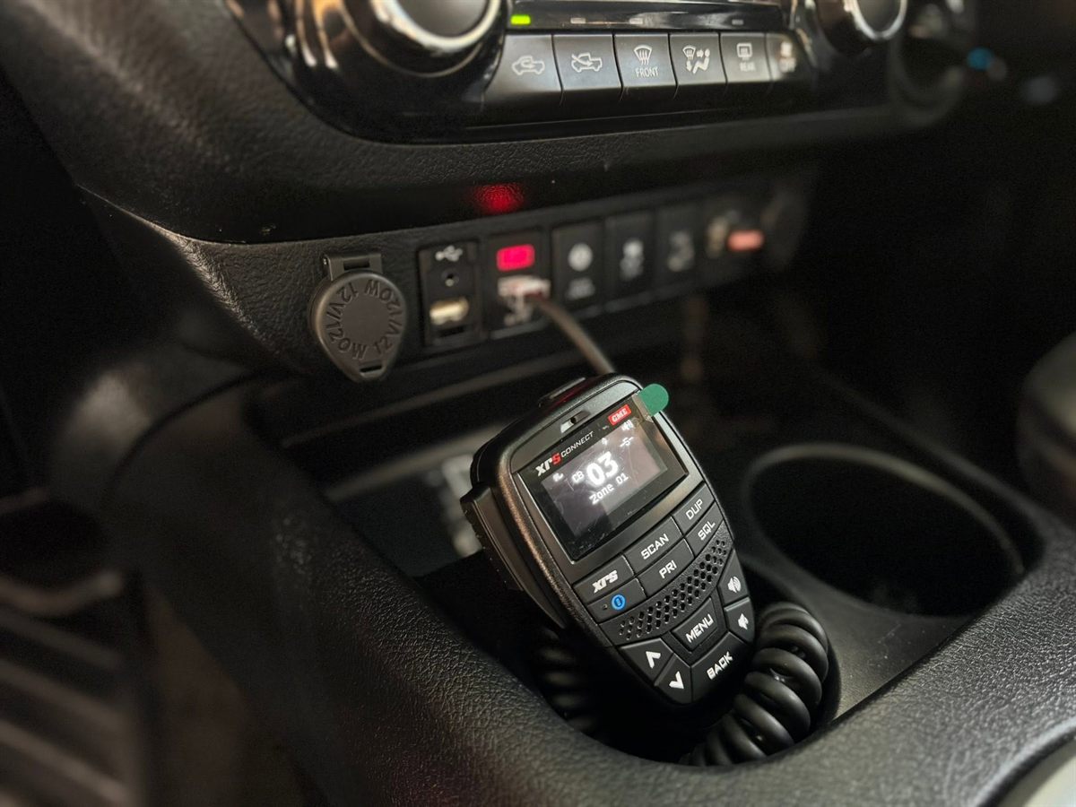 GME XRS Connect UHF handset mounted neatly in the centre console