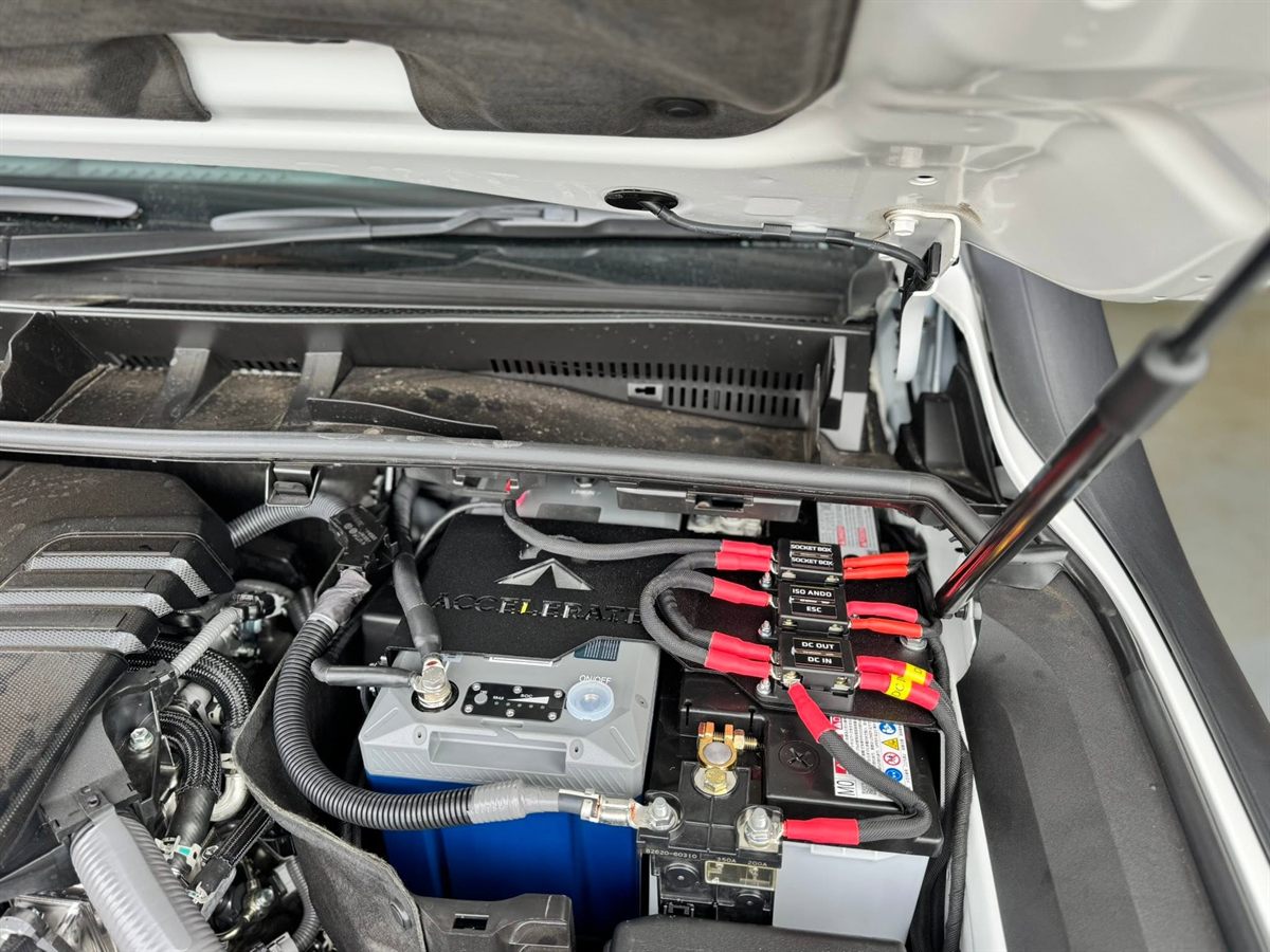 Accelerate auxiliary battery installed under the bonnet with labelled fused circuits