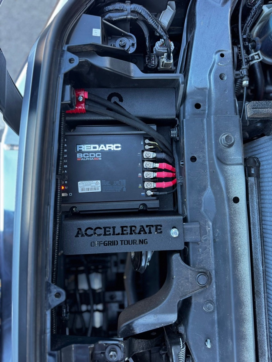 REDARC BCDC Alpha 50 charger mounted on an Accelerate Off-Grid Touring bracket