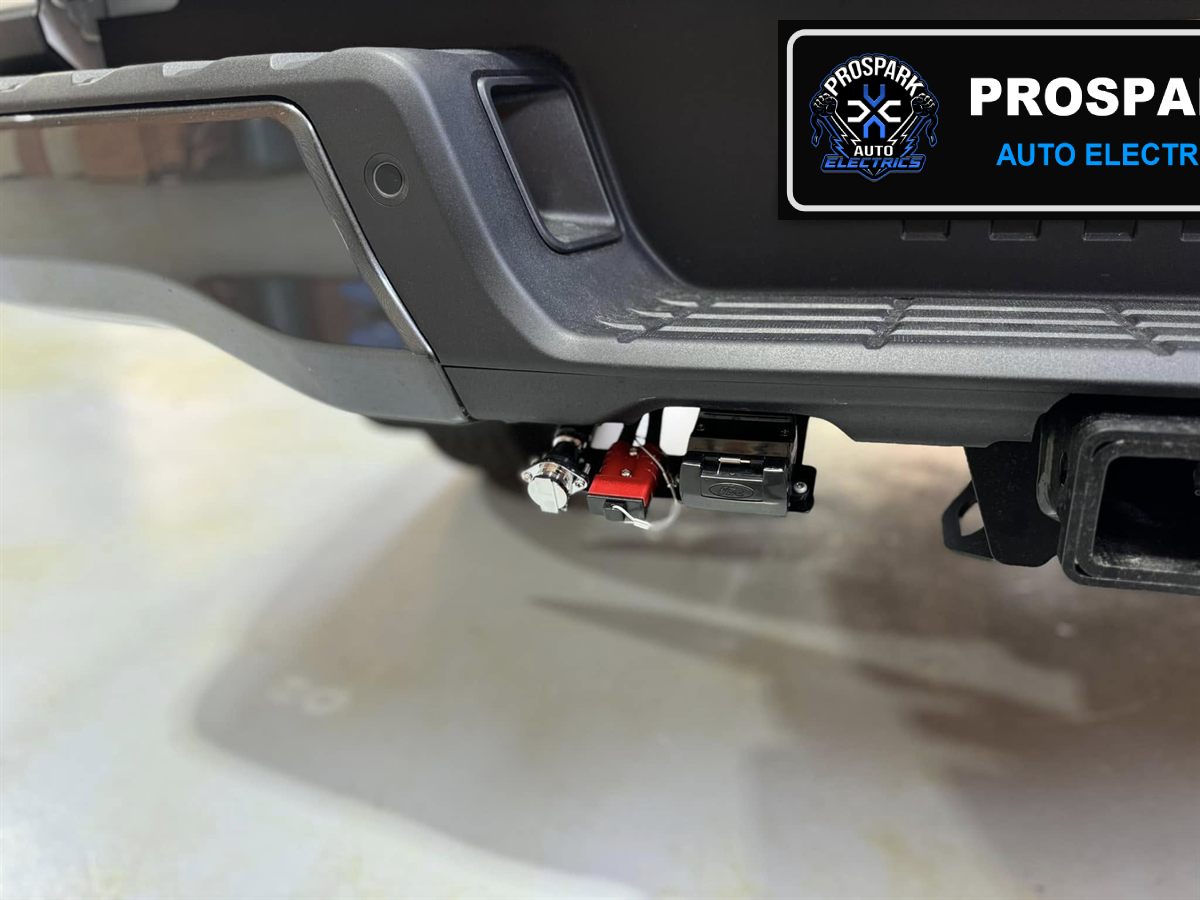 Trailer socket and Anderson plug neatly mounted under the rear bumper